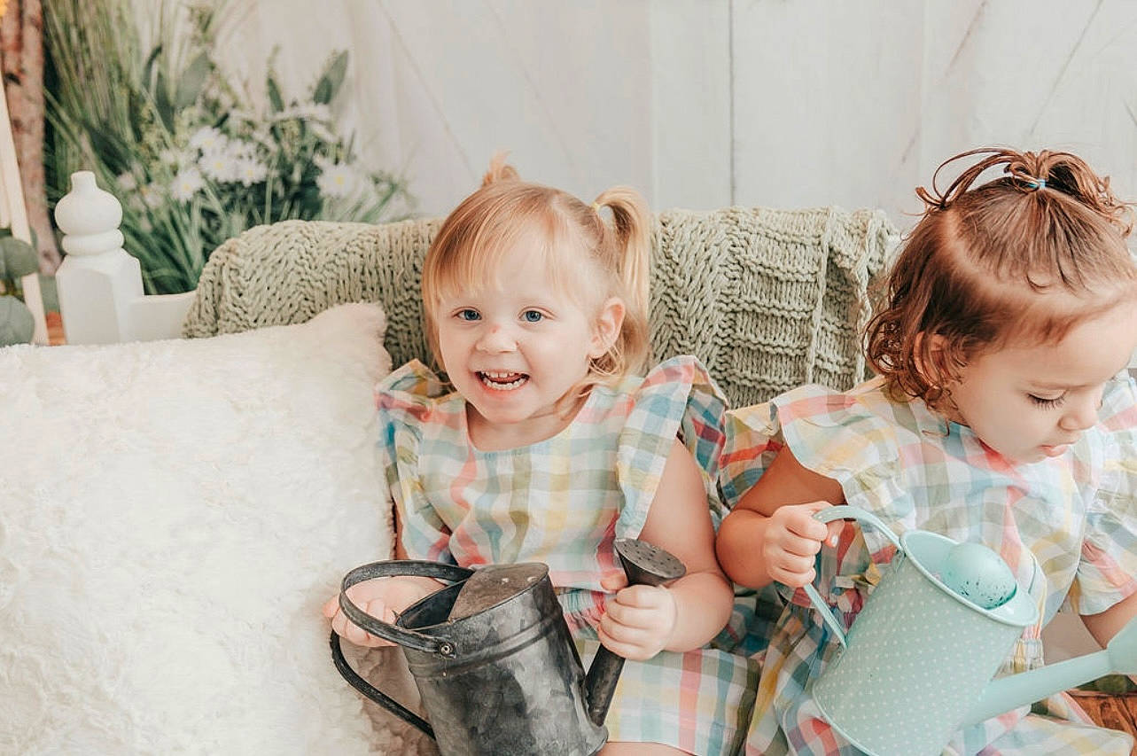 Kalani joined the competition — help win amazing prizes! baby, baby_toddler_clothing, chair, child, couch, dress, event, face, fashion, fashion_accessory, fun, happy, iris, joy, luggage_and_bags, pattern, person, plant, sitting, skin