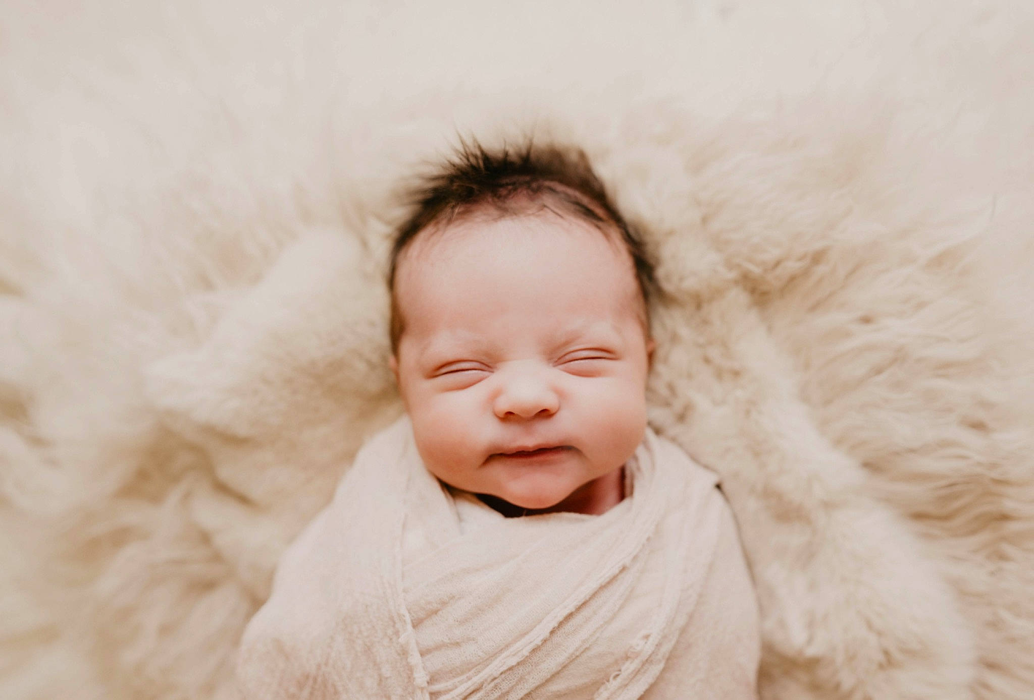 Harlow is registered to the contest to win money with this photo: baby, baby_toddler_clothing, cheek, child, comfort, ear, eye, eyelash, face, fur, fur_clothing, happy, linens, nose, peach, person, portrait_photography, smile, toddler