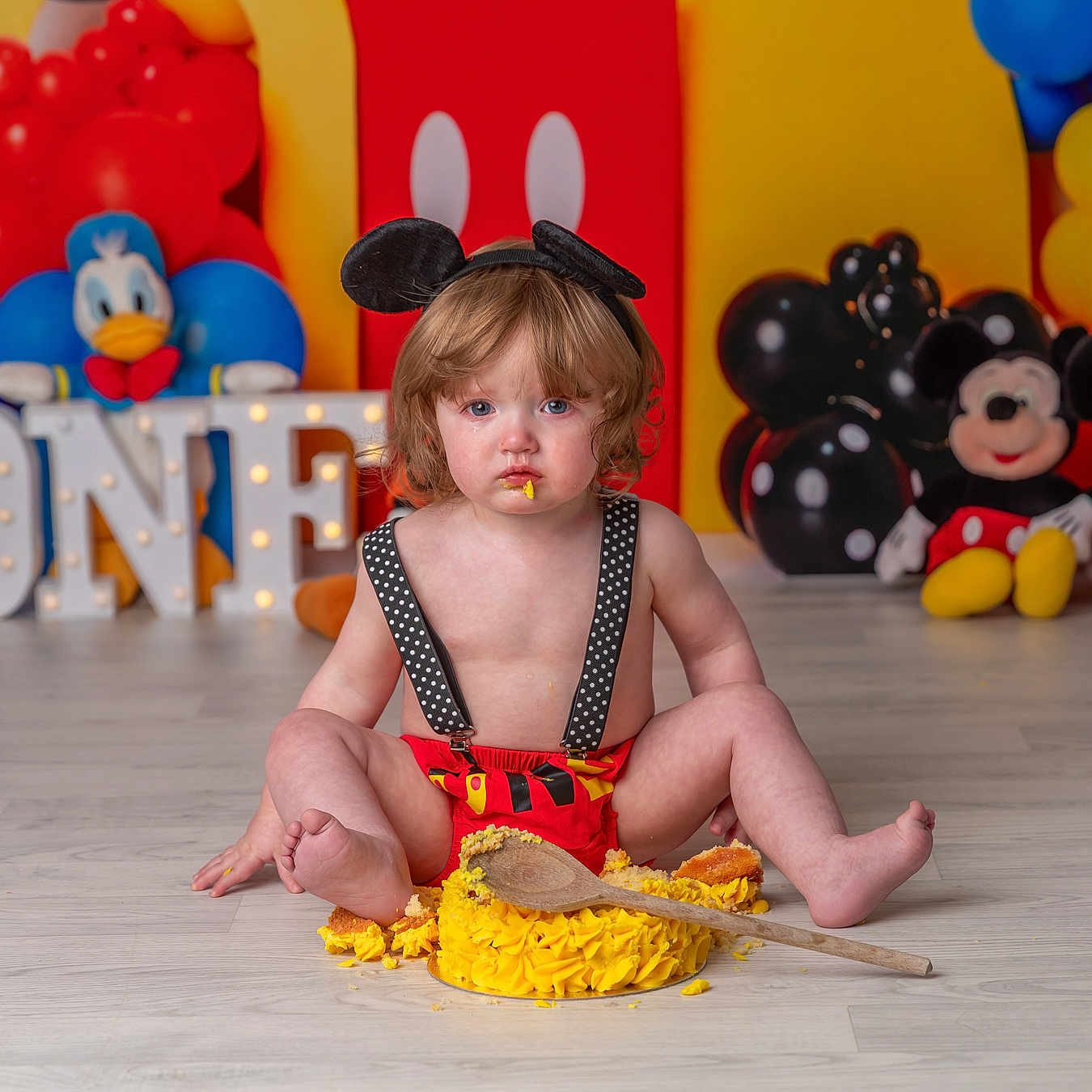 Arlo joined the competition — help win amazing prizes! baby, balloon, bodypart, clothing, cream, dessert, face, finger, food, hand, hardwood, hat, head, icing, person, sitting, sphere, sweets, toy, wood