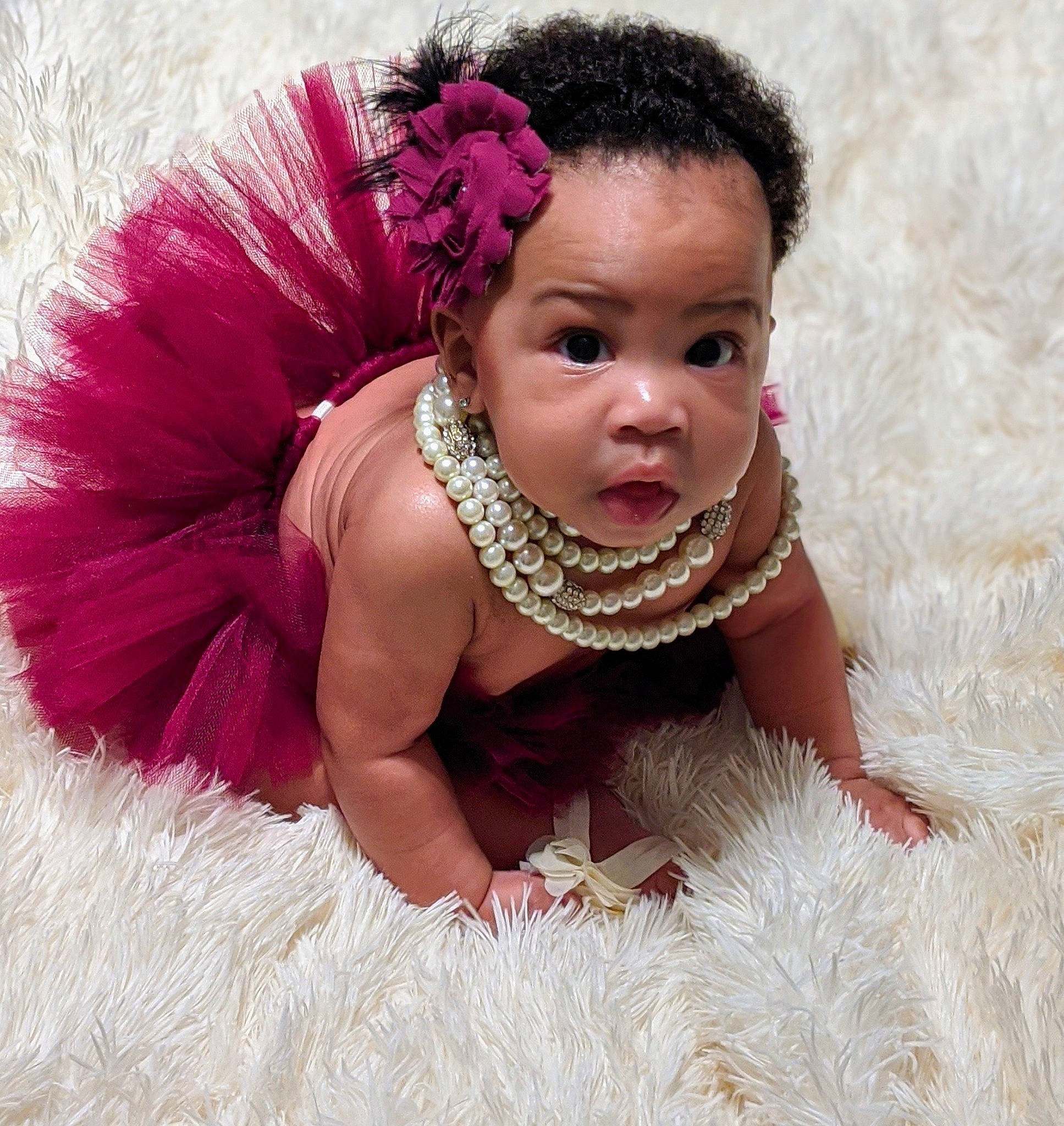 Tianna joined the competition — help win amazing prizes! baby, baby_products, baby_toddler_clothing, ballet_tutu, child, child_model, clothing, costume, costume_accessory, fashion_accessory, feather_boa, fur, hair_accessory, headband, headpiece, magenta, person, photo_shoot, photography, pink