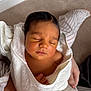 newborn, baby, sleeping, towel, wrapped, infant, peaceful, soft, closeup, skin, cute, resting, person, indoors, carpet, hand, comfort, warm, portrait, young