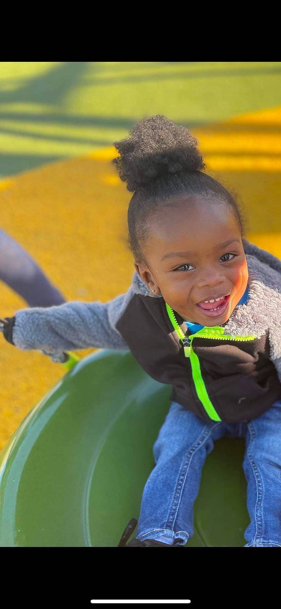 Jamareontae joined the competition — help win amazing prizes! child, competition_event, denim, fun, grass, happy, jeans, joy, leisure, outdoor_play_equipment, person, play, playground, recreation, sitting, smile, toddler