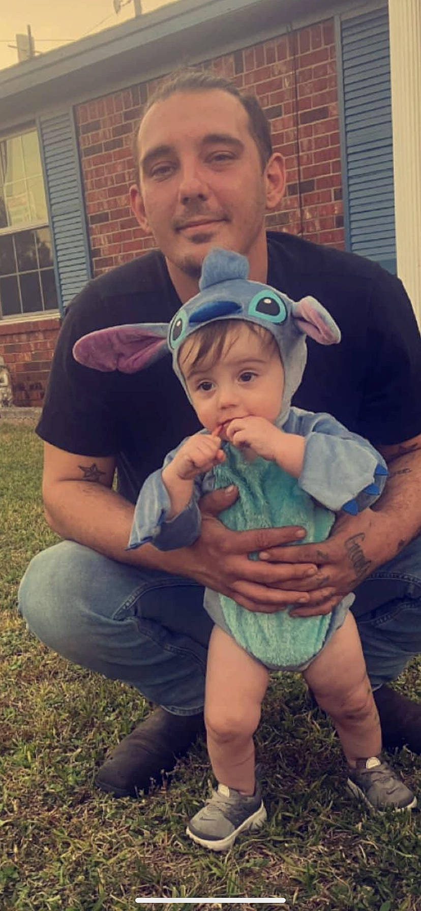 Joseph Jr. is registered to the contest to win money with this photo: baby, baby_toddler_clothing, child, cool, event, eye, fun, grass, happy, hat, interaction, iris, joy, muscle, person, plant, sitting, summer, t_shirt, thumb