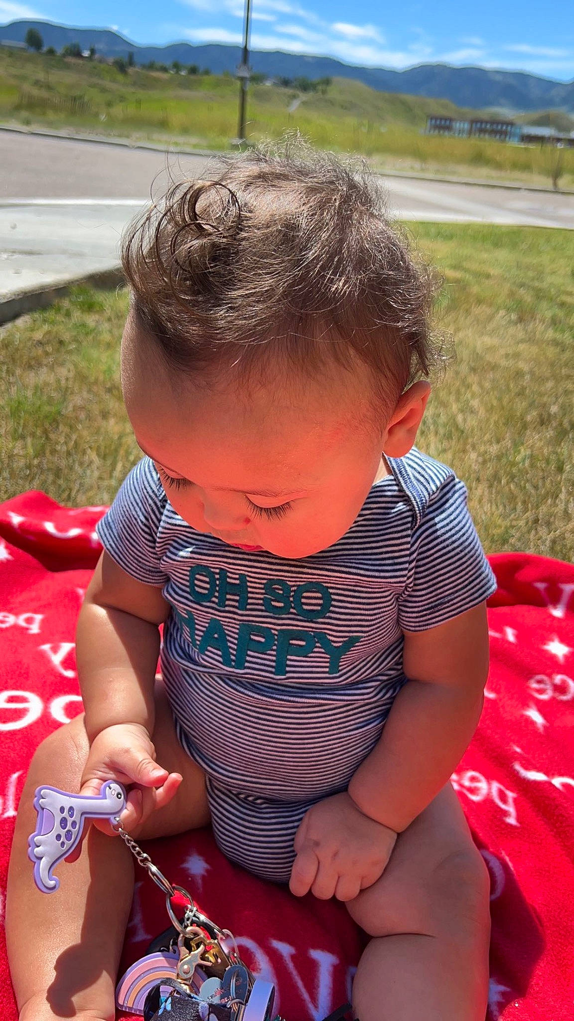Justin joined the competition — help win amazing prizes! baby, baby_products, baby_toddler_clothing, child, eyewear, fun, grass, happy, human_body, jewellery, leisure, pattern, people_in_nature, person, recreation, red, sitting, skin, summer, sunglasses