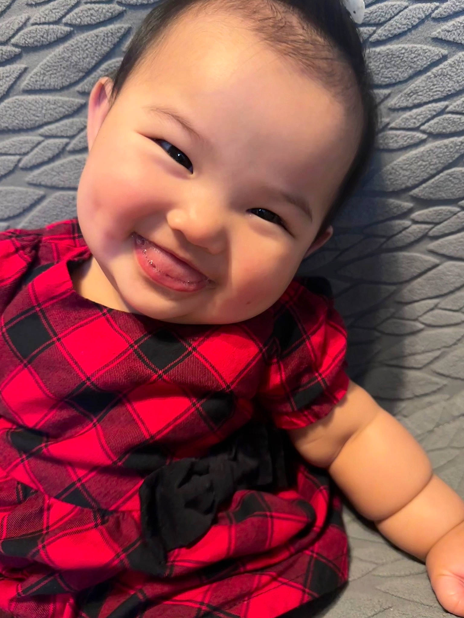 Anaya joined the competition — help win amazing prizes! arm, cheek, face, facial_expression, flash_photography, happy, human_body, iris, joy, lip, mouth, nose, person, pink, plaid, plant, red, skin, sleeve, smile
