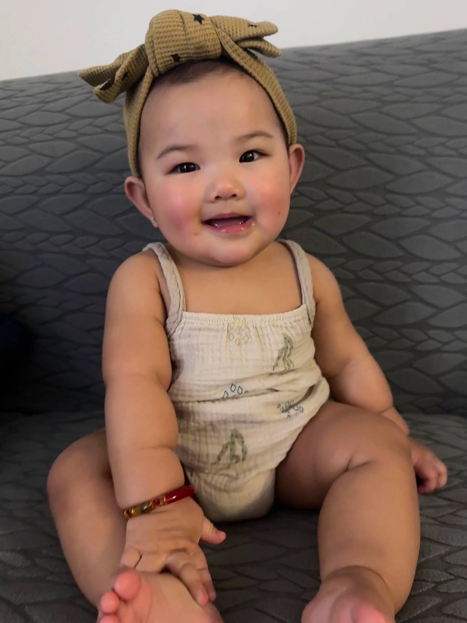 Anaya is registered to the contest to win money with this photo: arm, baby_toddler_clothing, cheek, eyelash, finger, flash_photography, gesture, hand, happy, head, human_body, joint, joy, leg, lip, neck, person, shoulder, skin, sleeve