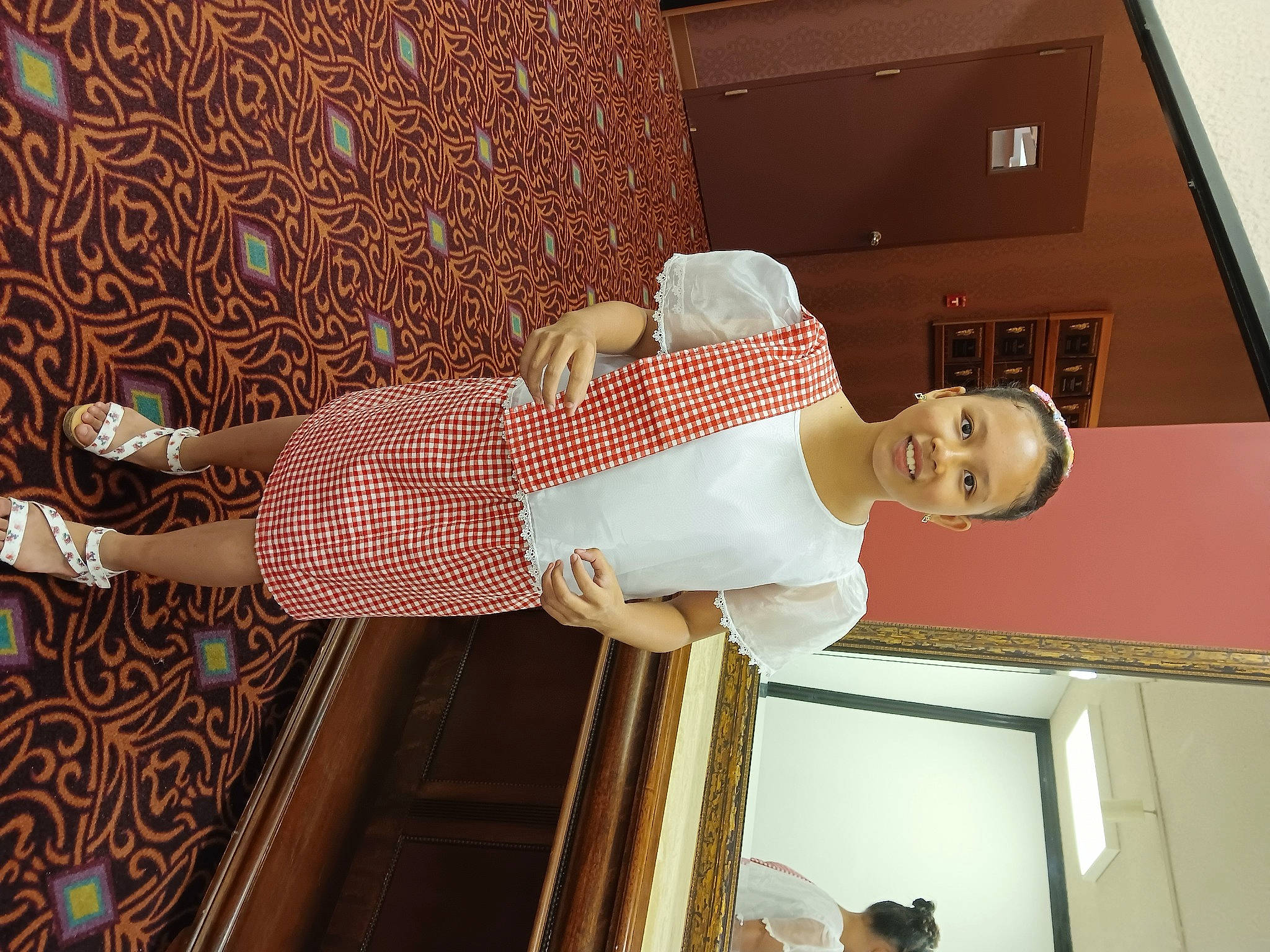 Angela Ghale is registered to the contest to win money with this photo: ceiling, child, fashion_design, flooring, fun, happy, human_leg, joy, pattern, person, plant, room, thigh, visual_arts, window, wood