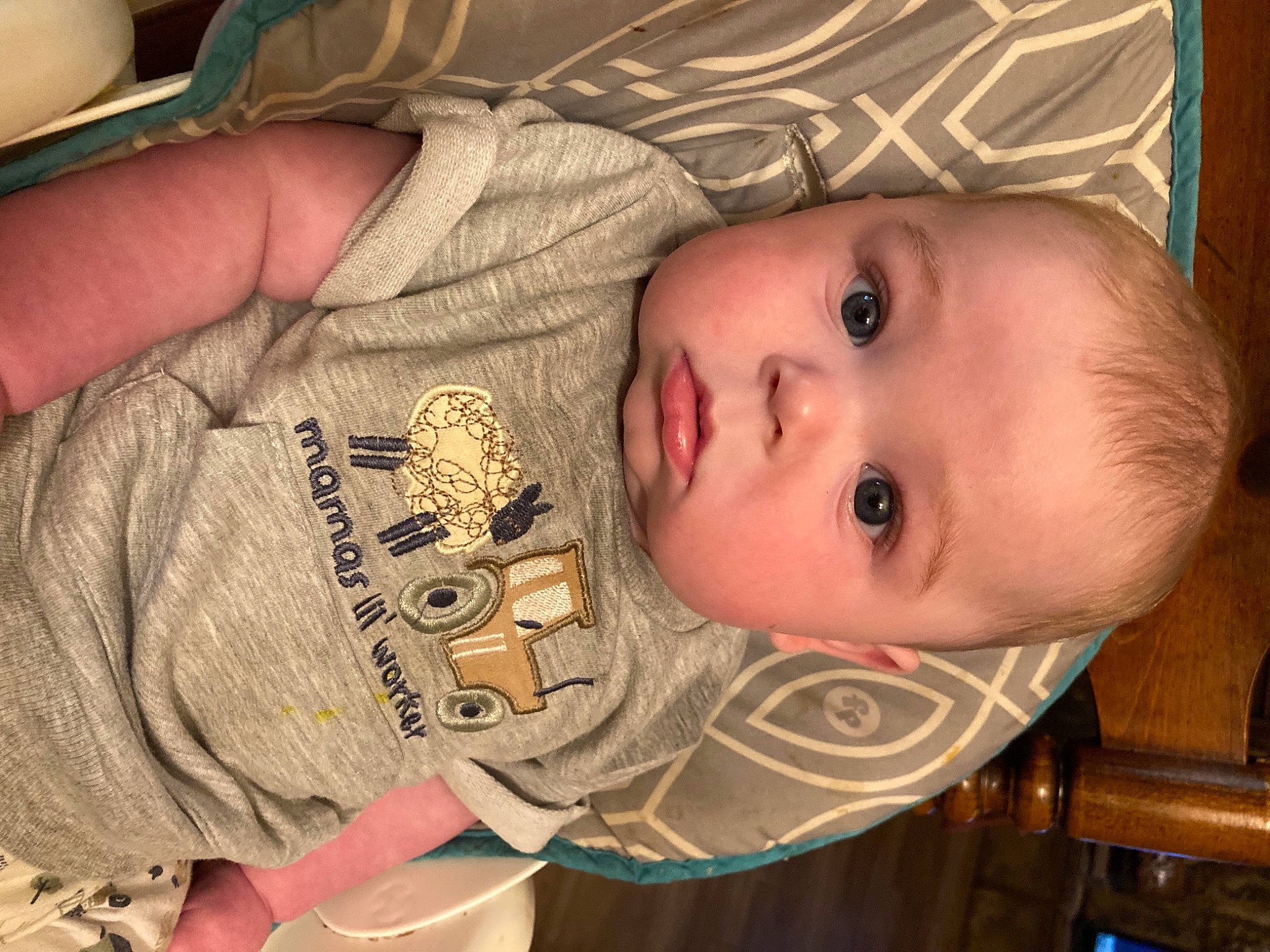 Shooter is registered to the contest to win money with this photo: baby, baby_toddler_clothing, cheek, chin, eye, eyebrow, eyelash, face, finger, forehead, head, human_body, iris, lip, mouth, nose, person, skin, sleeve, toddler