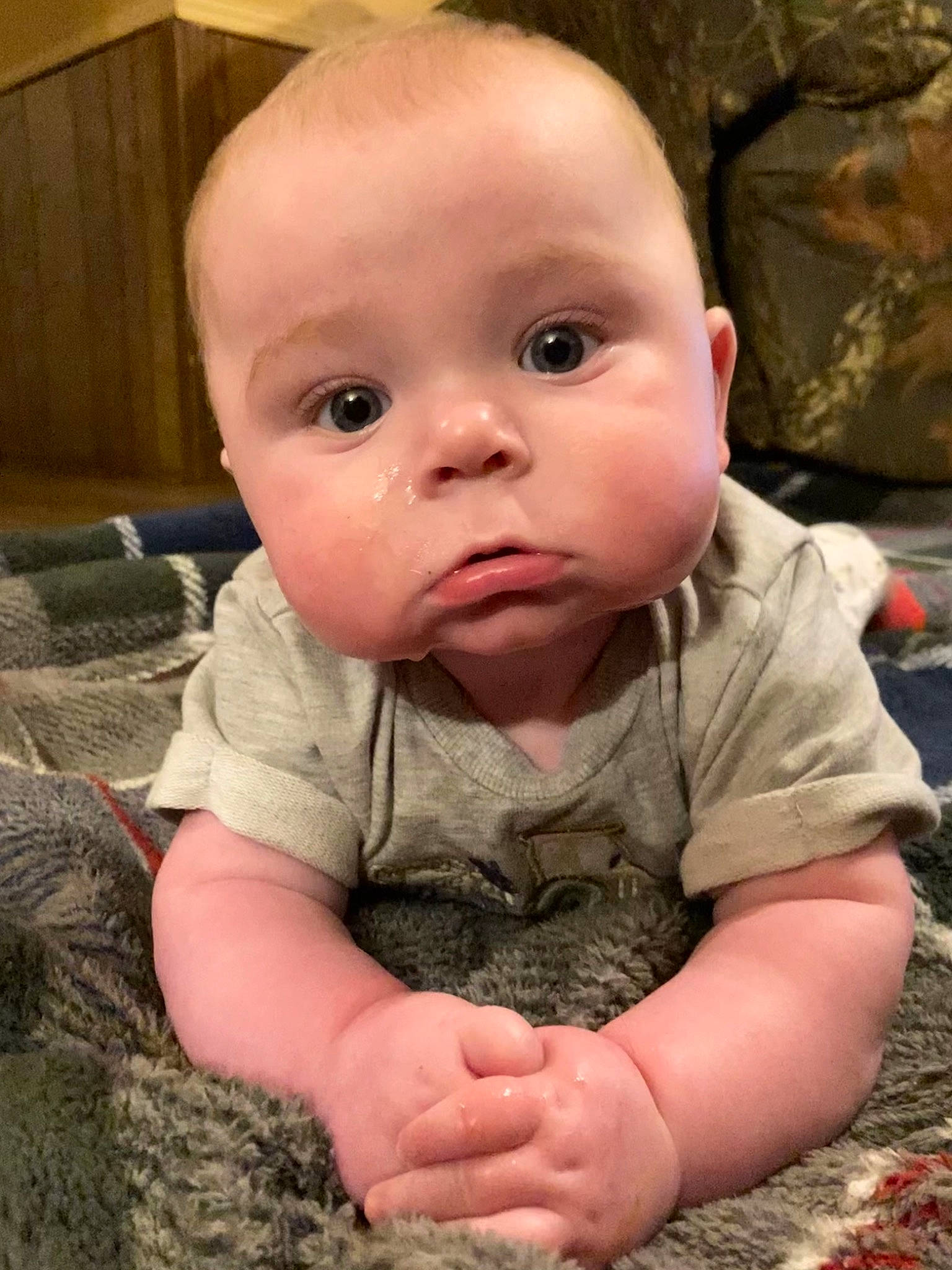 Shooter joined the competition — help win amazing prizes! baby, baby_toddler_clothing, cheek, child, comfort, crawling, eye, eyelash, flooring, fun, grass, military_camouflage, nose, people, person, sitting, skin, sleeve, t_shirt, toddler