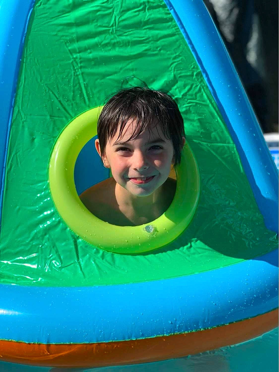 Swan participe au concours pour gagner de l'argent avec cette photo : aqua, child, fun, games, green, inflatable, joy, leisure, outdoor_play_equipment, person, play, recreation