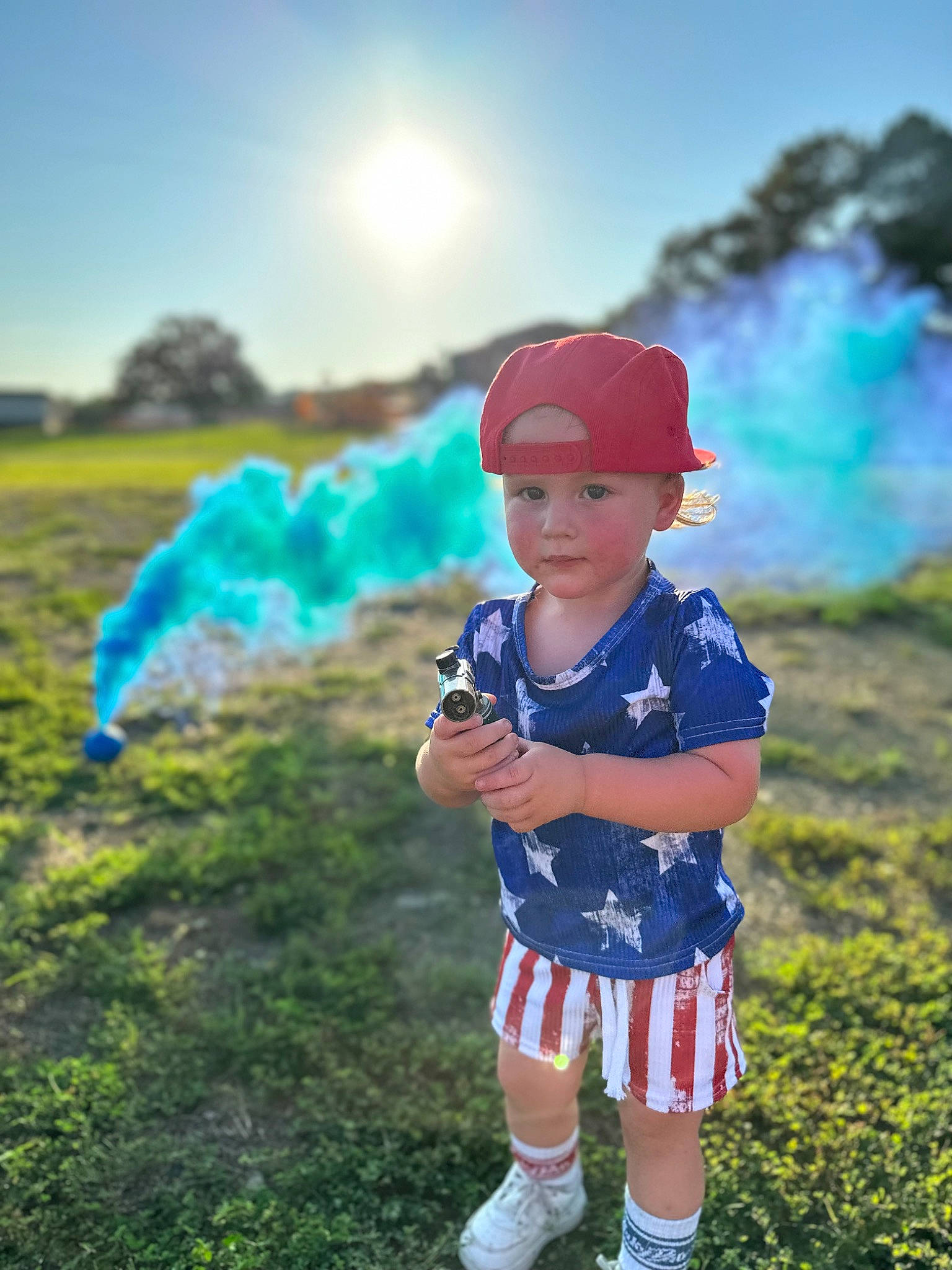 Bellamy is registered to the contest to win money with this photo: baby, baby_toddler_clothing, child, cloud, electric_blue, flash_photography, fun, grass, grass_family, grassland, happy, headwear, landscape, leisure, meadow, people_in_nature, person, prairie, shorts, sky