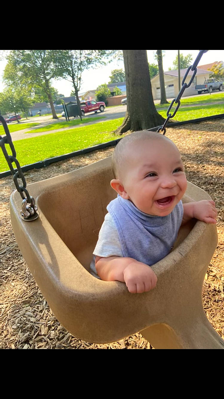 Hezekiah joined the competition — help win amazing prizes! automotive_tire, baby, baby_products, baby_toddler_clothing, city, fun, grass, happy, leisure, outdoor_play_equipment, person, plant, play, playground, recreation, sitting, skin, smile, swing, toddler