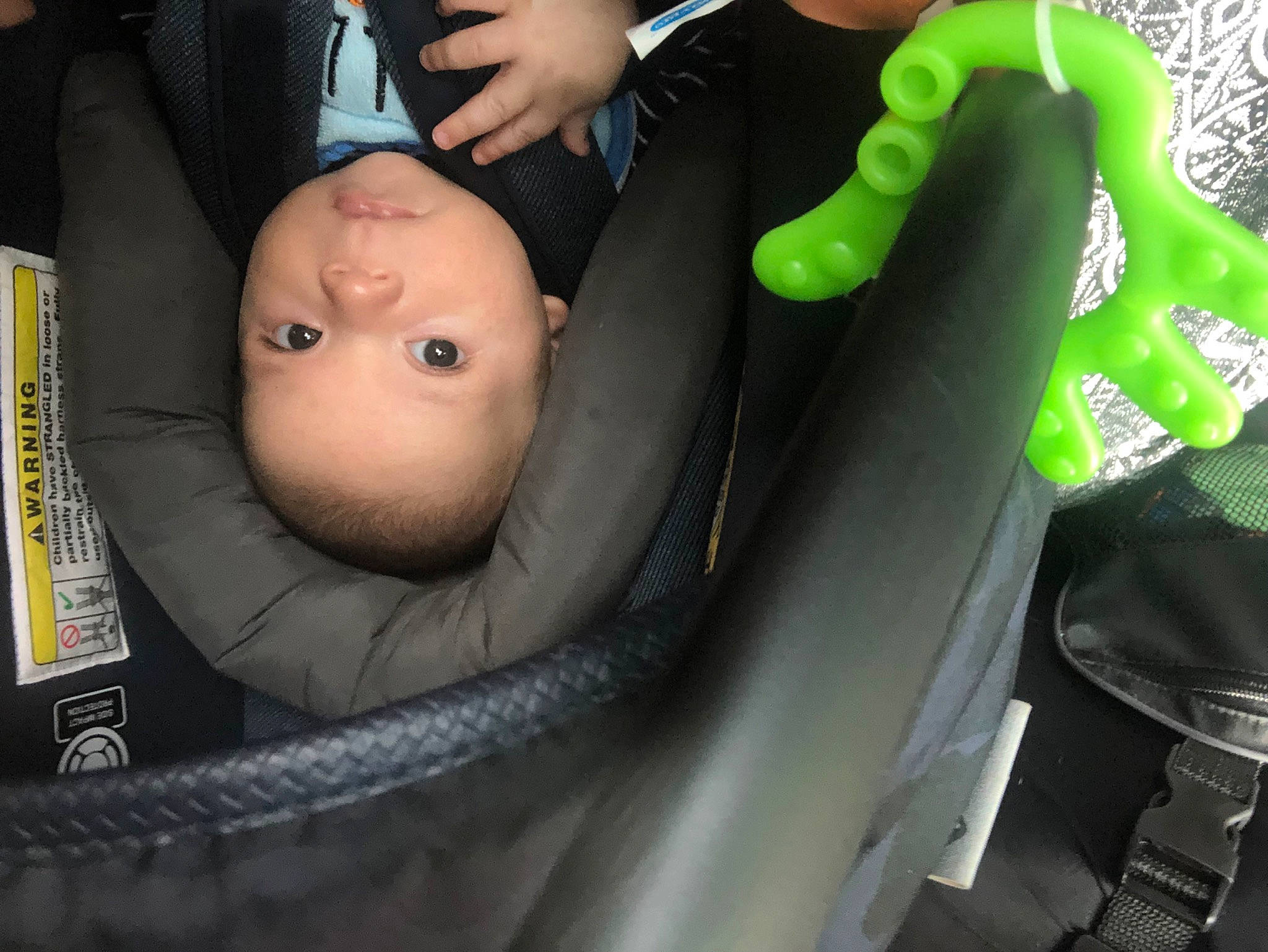 Hezekiah is registered to the contest to win money with this photo: auto_part, baby, baby_carriage, baby_products, baby_safety, car_seat, cheek, child, comfort, facial_expression, fun, gesture, person, personal_protective_equipment, seat_belt, sitting, skin, thumb, tire, toddler