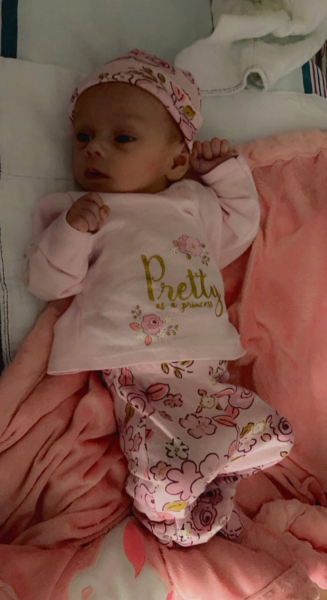 Elizabeth is registered to the contest to win money with this photo: baby, baby_products, baby_safety, baby_sleeping, baby_toddler_clothing, cap, cheek, child, comfort, face, finger, happy, headwear, linens, pattern, person, pink, skin, sleeve, t_shirt