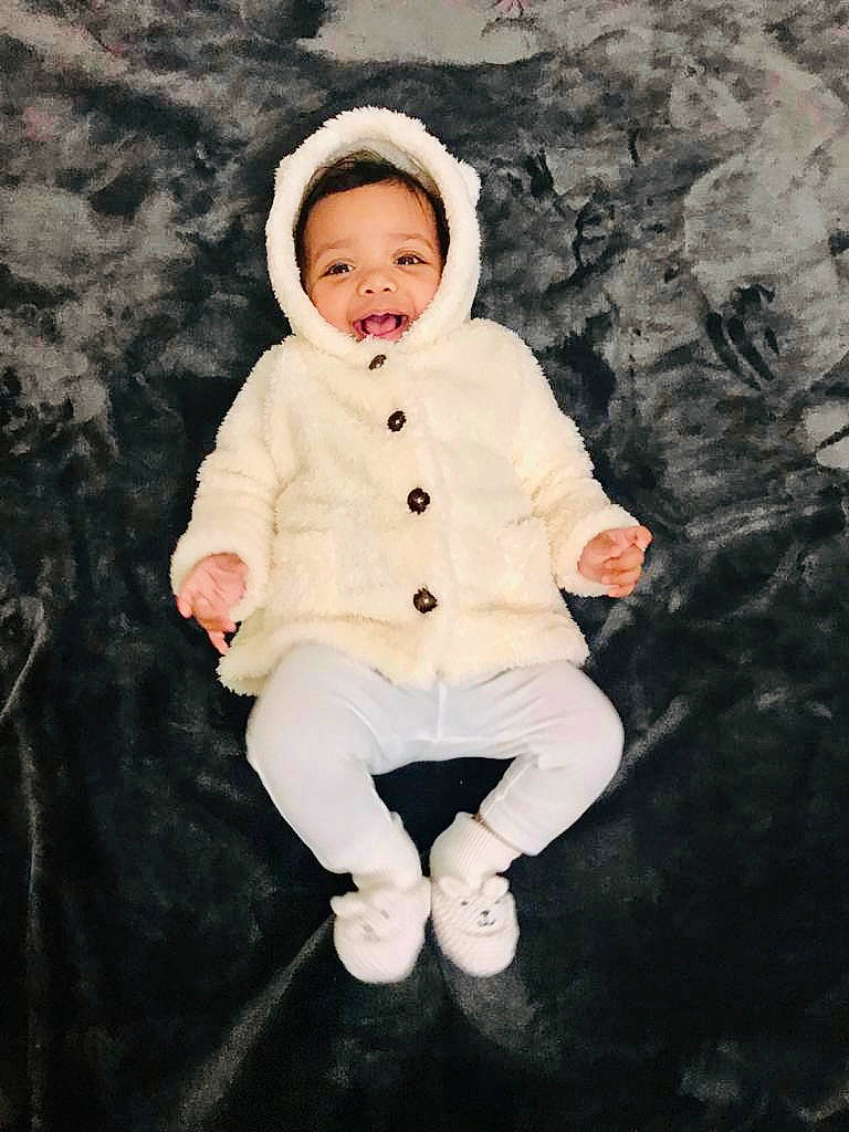 Amaira joined the competition — help win amazing prizes! baby, baby_toddler_clothing, eye, flash_photography, freezing, fun, fur, gesture, happy, headgear, human_body, monochrome_photography, people_in_nature, person, plant, sitting, sleeve, smile, toddler, tree