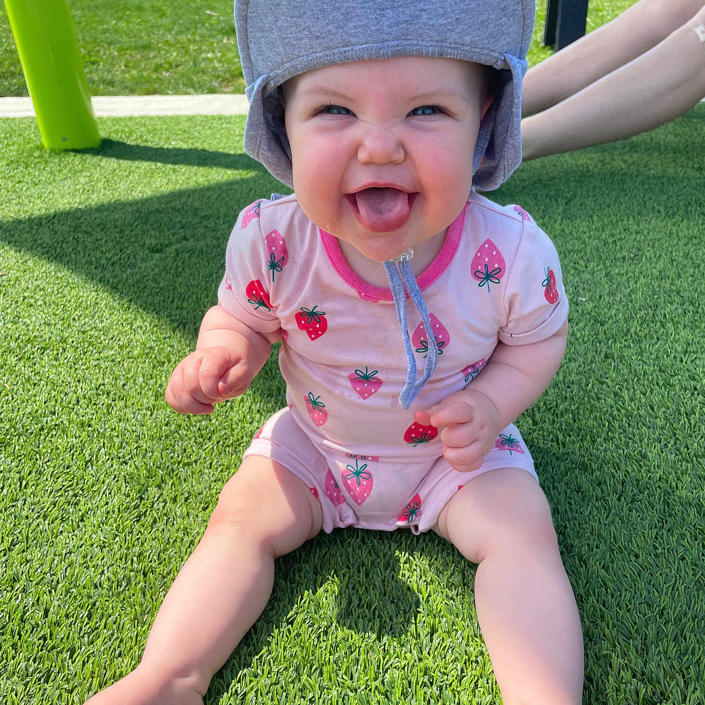 Everly joined the competition — help win amazing prizes! baby, cap, car, clothing, face, grass, happy, hat, head, lawn, nature, outdoors, park, person, photography, plant, playarea, portrait, transportation, vehicle