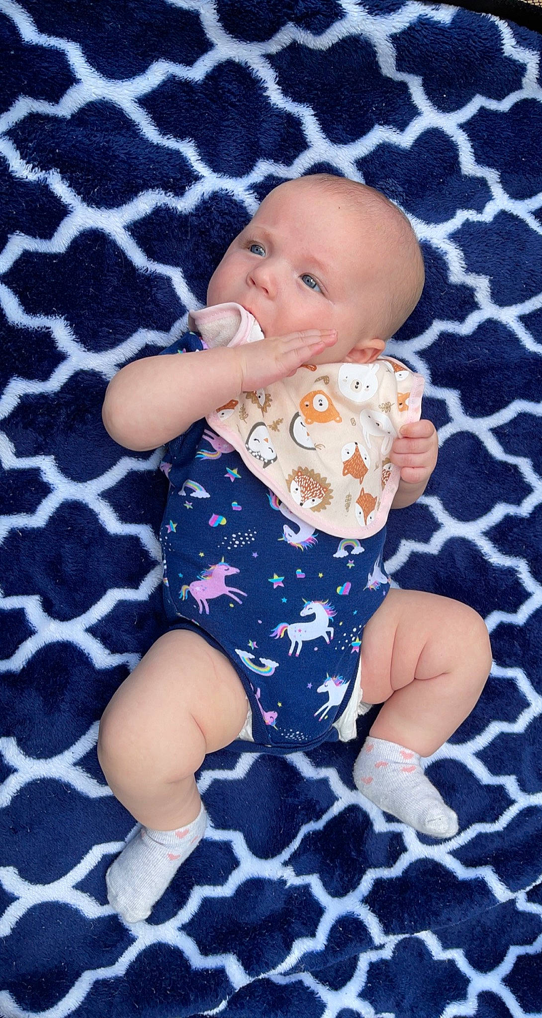 Bethany joined the competition — help win amazing prizes! baby, baby_toddler_clothing, cheek, child, electric_blue, eye, finger, head, human_body, human_leg, knee, pattern, person, purple, sitting, skin, sleeve, smile, textile, thigh