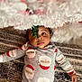 Kamran joined the competition — help win amazing prizes! baby, carpet, child, christmas, christmas_tree, cozy, curly_hair, cute, decorations, face, festive, floor, holiday, indoors, infant, looking_up, pajamas, santa_claus, smiling, soft