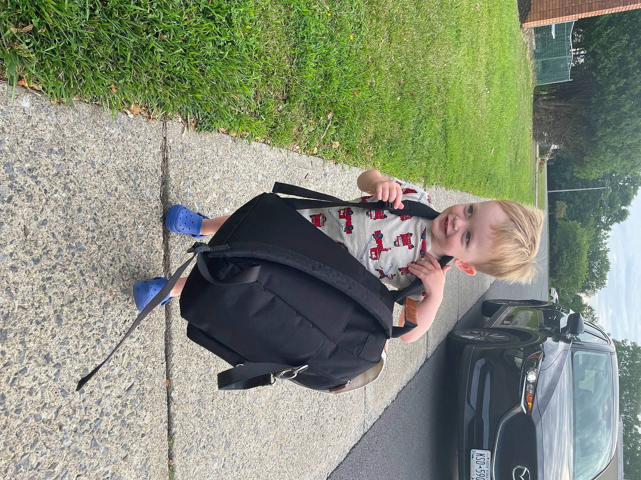 Maverick joined the competition — help win amazing prizes! asphalt, automotive_exterior, automotive_lighting, baby, baby_carriage, baby_products, car, grass, joy, motor_vehicle, person, plant, road_surface, sidewalk, tire, toddler, travel, tree, trunk, vehicle