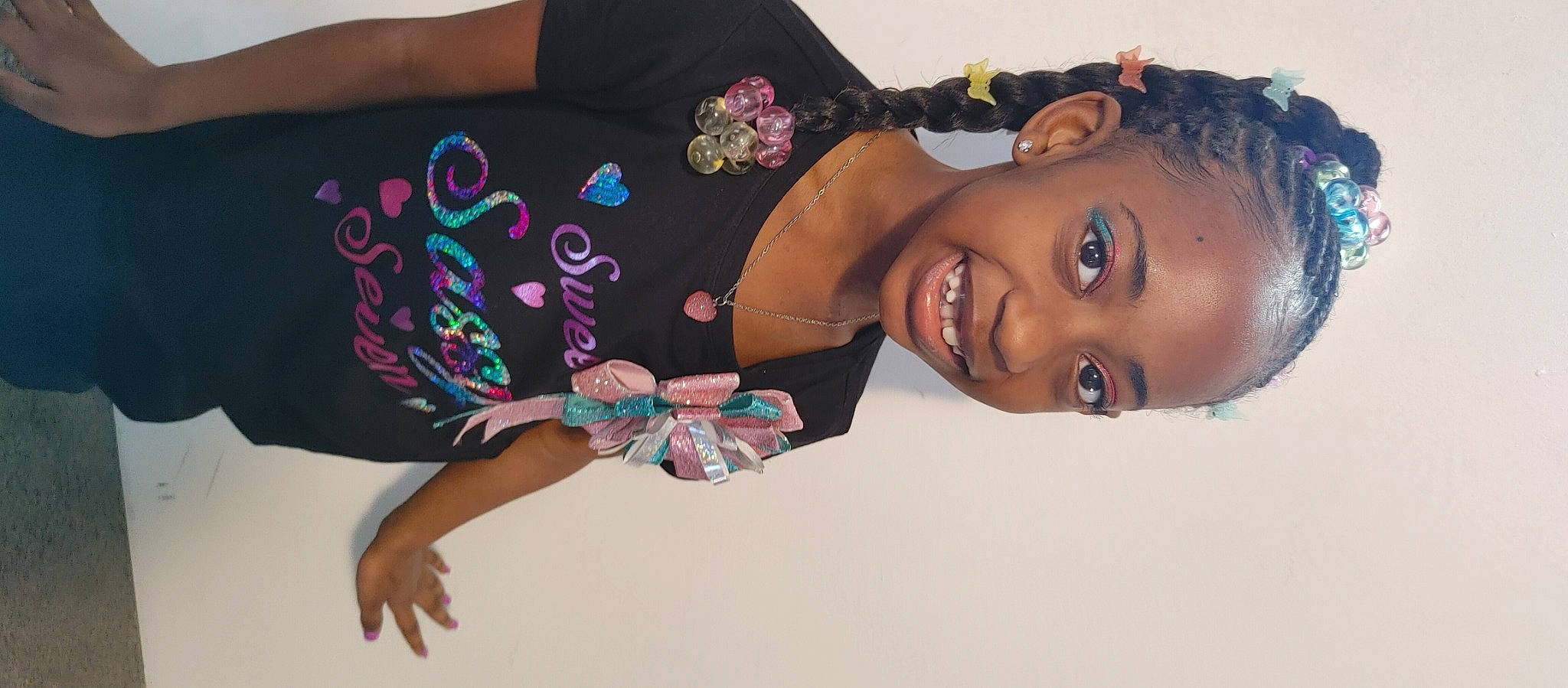 Serenity is registered to the contest to win money with this photo: arm, black_hair, dress, elbow, eyelash, fashion_design, flash_photography, gesture, hand, happy, human_body, jewellery, joint, joy, long_hair, neck, person, skin, sleeve, smile