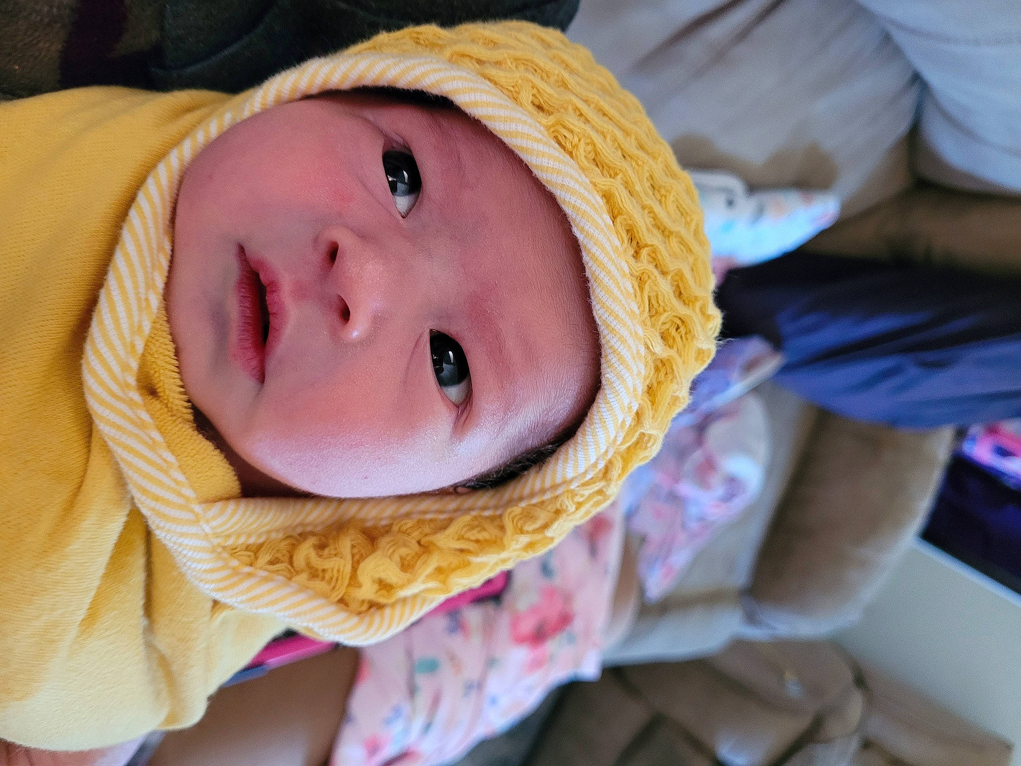 Mariella is registered to the contest to win money with this photo: baby, baby_toddler_clothing, cheek, child, comfort, eyelash, fun, fur, happy, hat, headwear, iris, linens, lip, nose, outerwear, person, skin, sleeve, smile