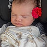 baby, newborn, sleeping, infant, portrait, face, flower, red_flower, blanket, teddy_bears, car_seat, swaddled, indoors, peaceful, cute, closed_eyes, child, baby_clothing, textile, photography