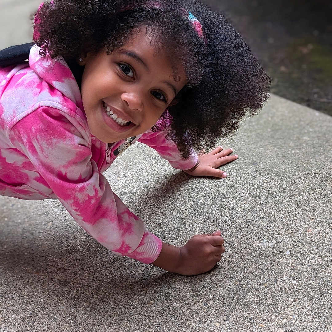 Gabriella joined the competition — help win amazing prizes! blackhair, bodypart, child, clothing, coat, dress, face, female, finger, girl, hair, hand, happy, head, jacket, person, photography, portrait, road, smile