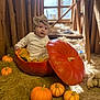baby, pumpkin, fall, autumn, barn, headband, child, orange, cozy, cute, decor, hay, window, soft_light, small_pumpkins, seasonal, curious, sitting, indoors, costume