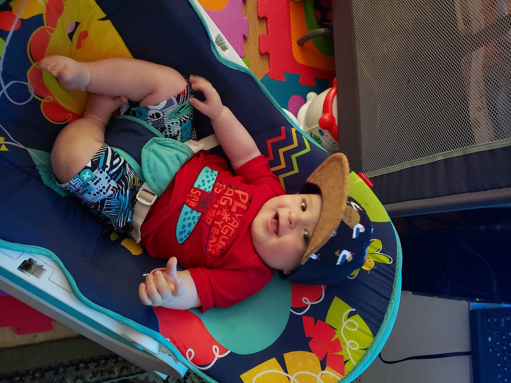 Noah-james participe au concours pour gagner de l'argent avec cette photo : baby, baby_products, baby_toddler_clothing, baby_toys, child, comfort, fun, happy, headwear, human_body, human_leg, lap, leisure, pattern, person, play, recreation, sitting, smile, thigh