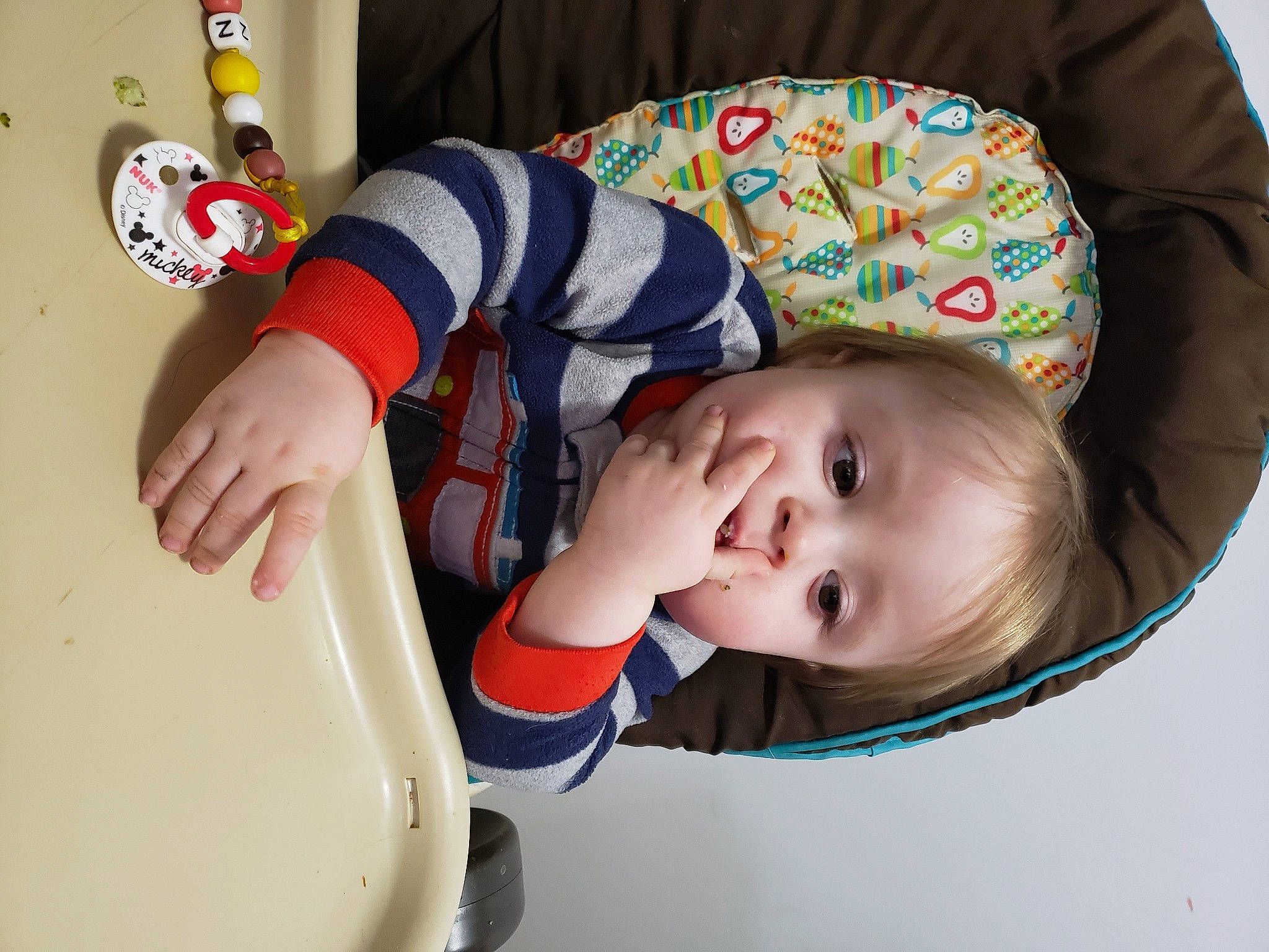 Noah-james participe au concours pour gagner de l'argent avec cette photo : baby, baby_products, baby_safety, baby_toddler_clothing, baby_toys, carmine, child, comfort, elbow, face, fun, head, headgear, pattern, person, room, sitting, sleeve, toddler