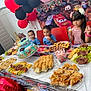 balloons, birthday_cake, birthday_party, cake, celebration, chair, cheese, child, children, cupcake, decorations, food, grapes, happy, indoor, party, pastry, salami, snacks, table