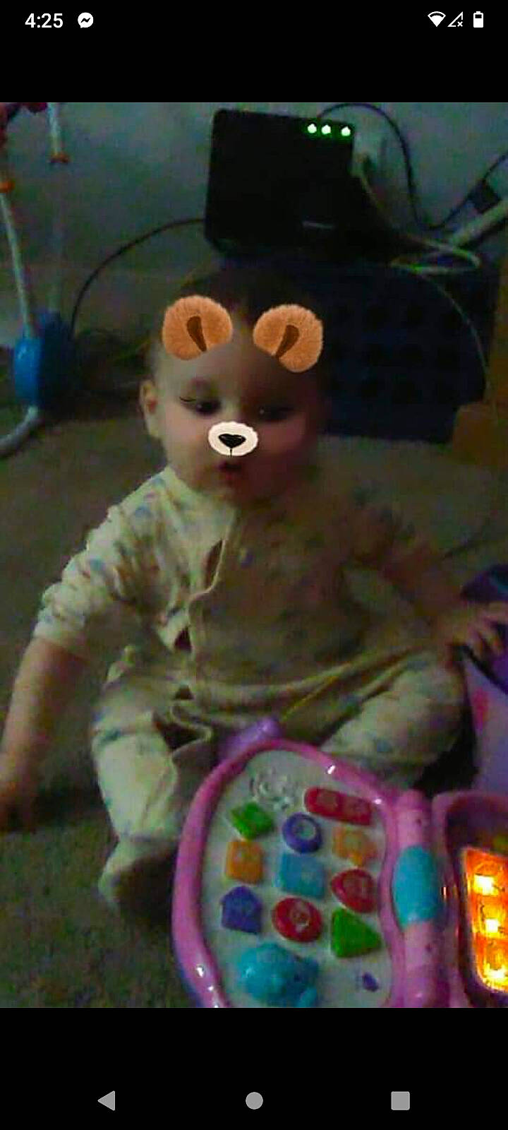 Carter is registered to the contest to win money with this photo: animation, baby, baby_products, baby_toys, child, fictional_character, flooring, fun, fur, magenta, person, play, plush, room, sitting, stuffed_toy, sweetness, technology, teddy_bear, toddler