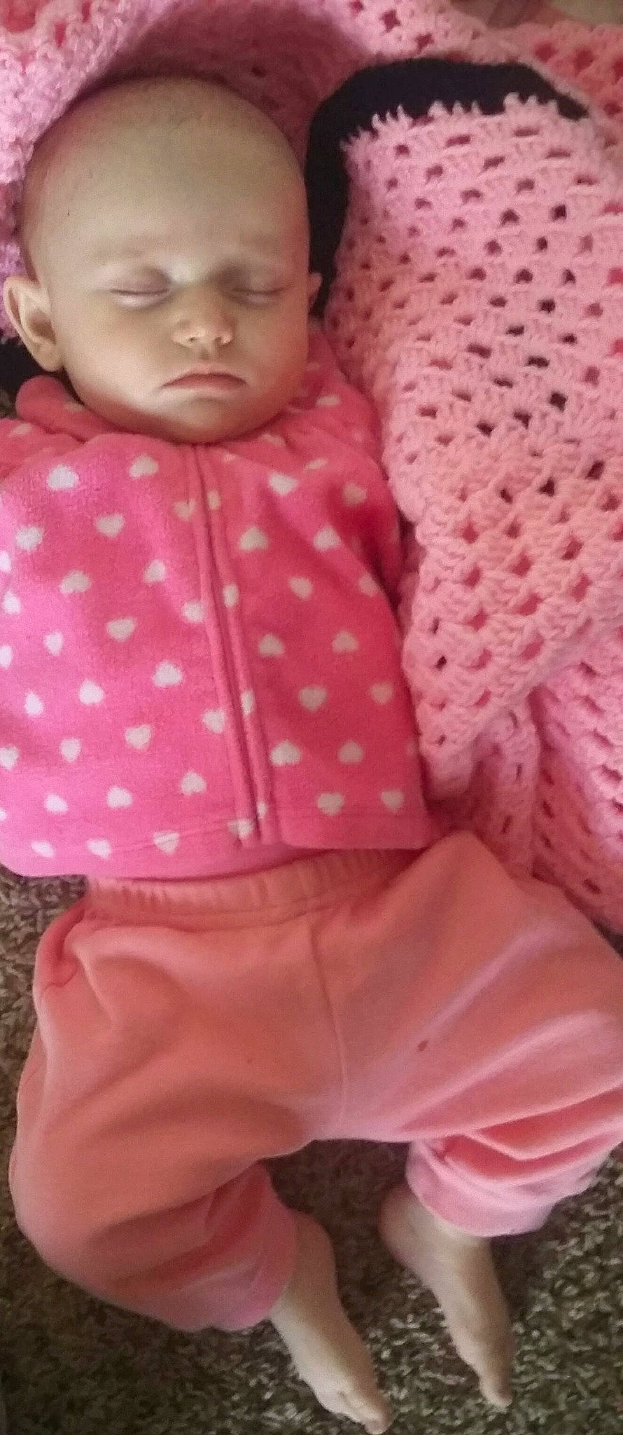 Isabella joined the competition — help win amazing prizes! baby_products, baby_toddler_clothing, child, doll, eyelash, fashion_design, linens, magenta, outerwear, pattern, peach, person, pink, polka_dot, skin, sleeve, textile, toddler, toy, white