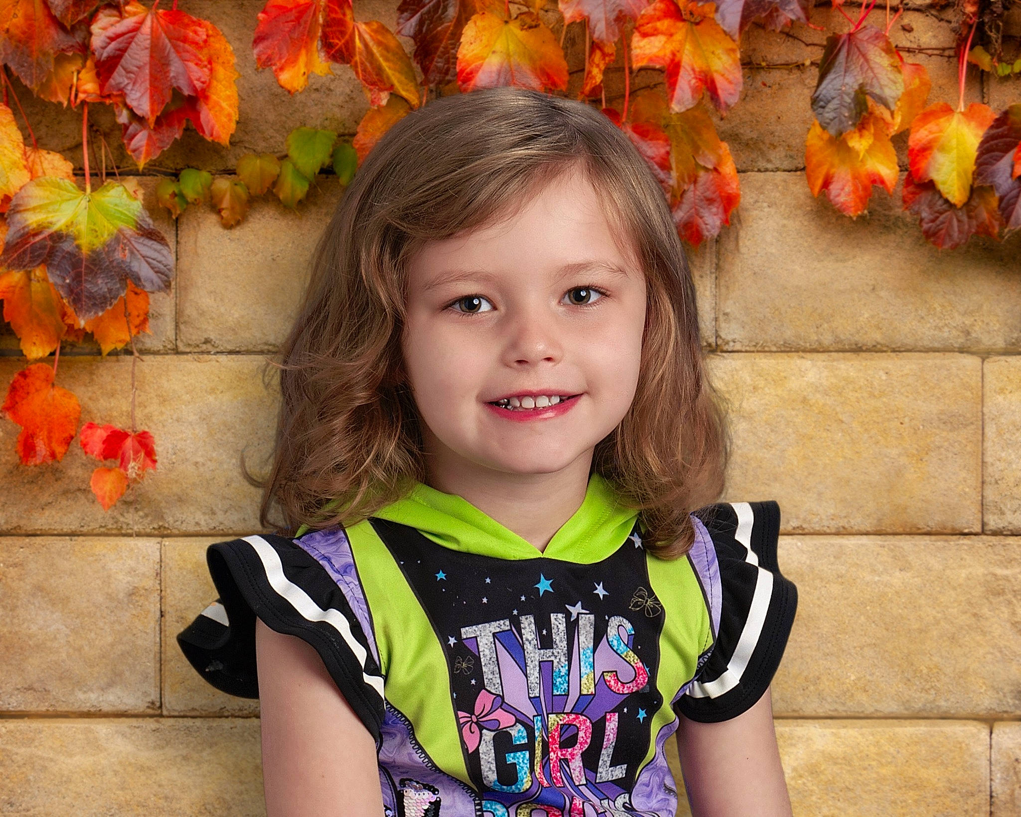 Marsha is registered to the contest to win money with this photo: baby_toddler_clothing, beauty, child, eye, facial_expression, fun, hair, happy, head, iris, joy, leaf, morning, orange, people_in_nature, person, plant, sleeve, smile, t_shirt