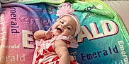 Emerald joined the competition — help win amazing prizes! baby, bed, blanket, clothing, couch, crib, cushion, dress, face, furniture, happy, hat, head, homedecor, infantbed, newborn, person, photography, portrait, quilt
