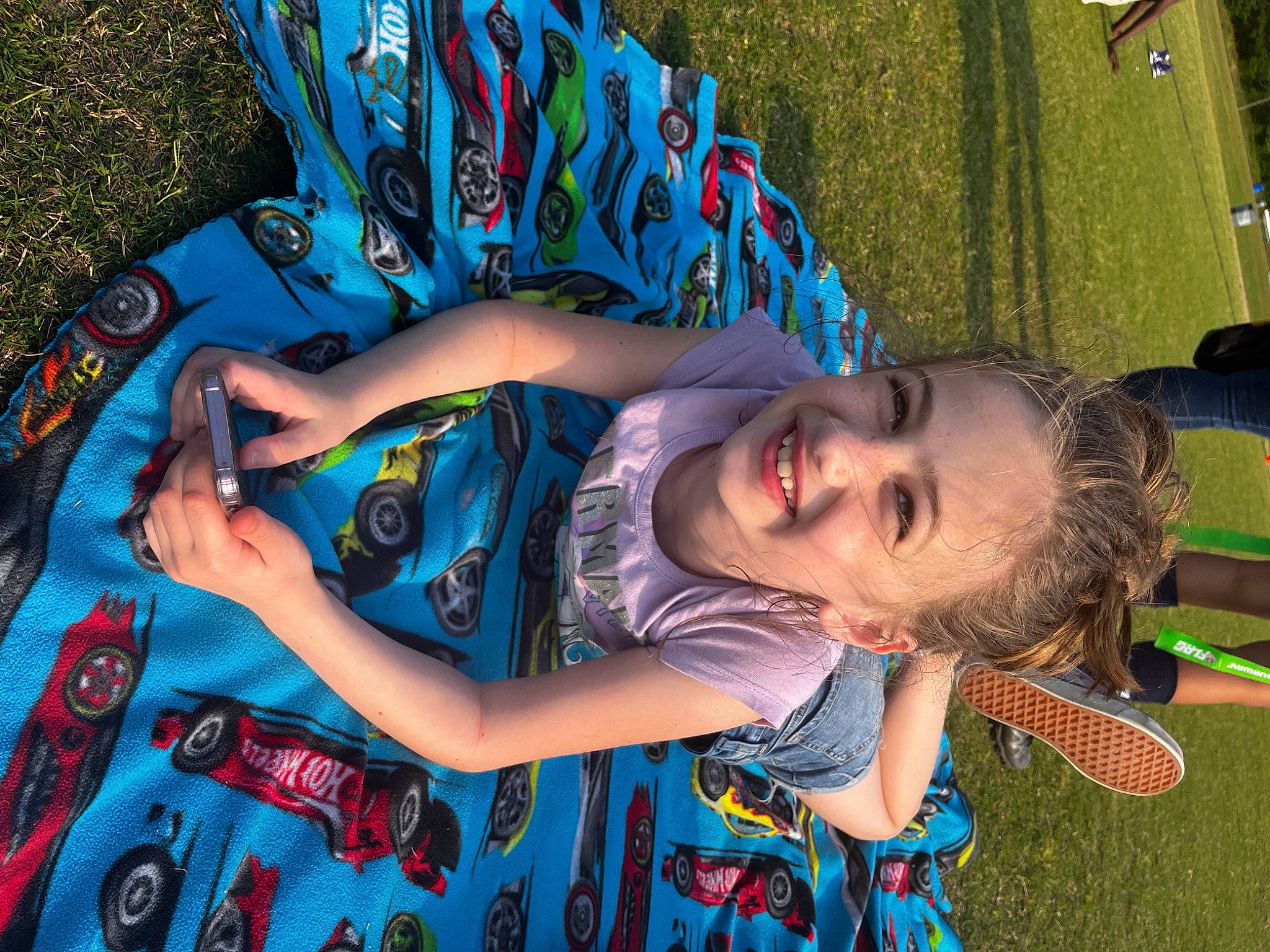 Addyson joined the competition — help win amazing prizes! artist, blue, child, cool, electric_blue, event, fun, grass, green, hairstyle, happy, human, joy, leisure, magenta, pattern, person, recreation, smile, t_shirt