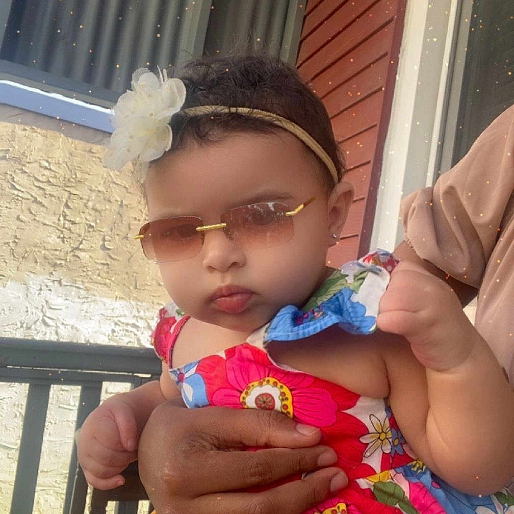 Shantalys joined the competition — help win amazing prizes! accessory, baby, child, colorful, curtain, cute, fashion, floral_dress, flower_headband, hand, holding, outdoor, person, porch, portrait, railing, skin, summer, sunglasses, window