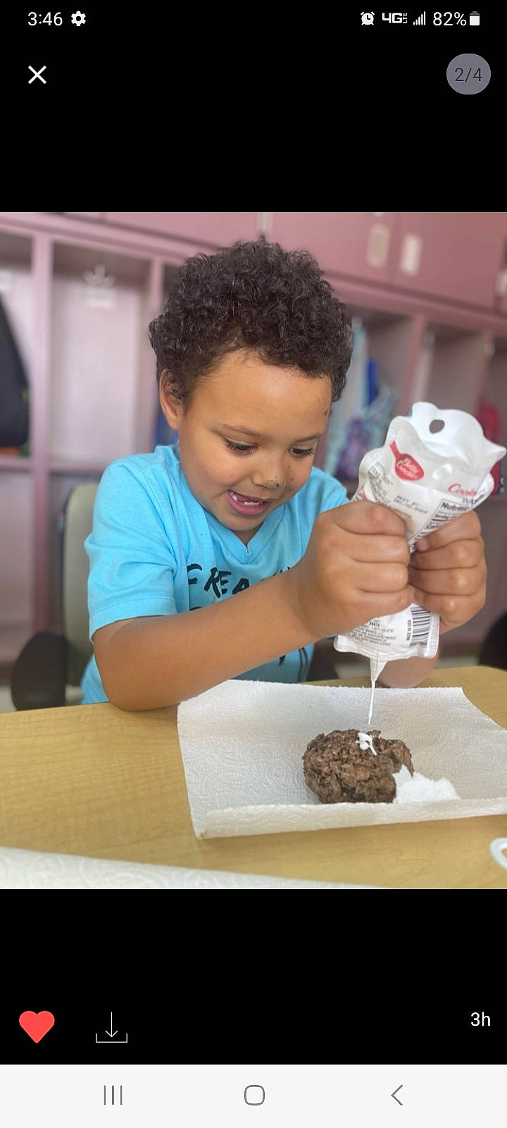 Zayden is registered to the contest to win money with this photo: buttercream, cake, cake_decorating, chair, child, comfort_food, cream, cuisine, desk, dessert, food, icing, joy, person, plate, recipe, sugar_cake, sweetness, t_shirt, table