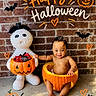 baby, child, infant, smiling, halloween, pumpkin, costume, mummy, candy, candy_bowl, brick_wall, bat, jack_o_lantern, holiday, autumn, outdoor, sitting, portrait, decorations, barefoot