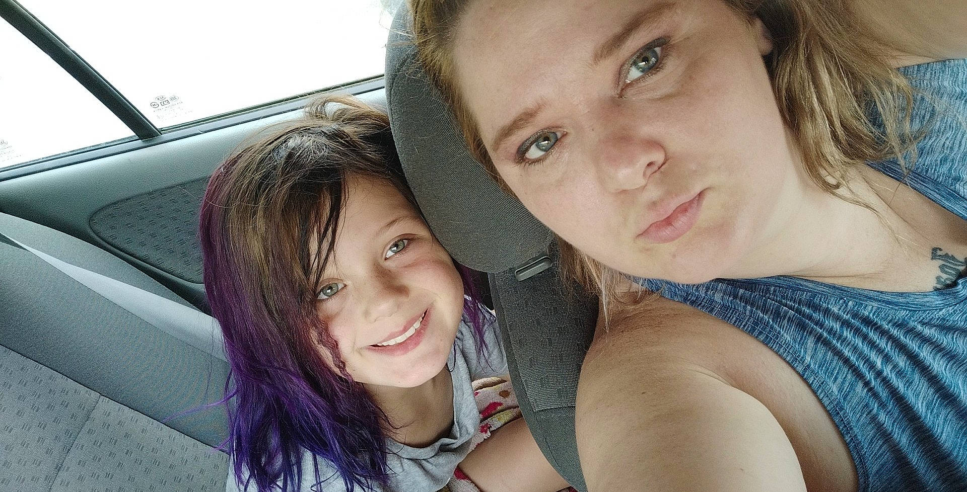 Gabby is registered to the contest to win money with this photo: black_hair, car, chin, eyebrow, eyelash, face, fun, gesture, hair, happy, iris, jaw, joy, lip, mouth, neck, nose, person, selfie, skin