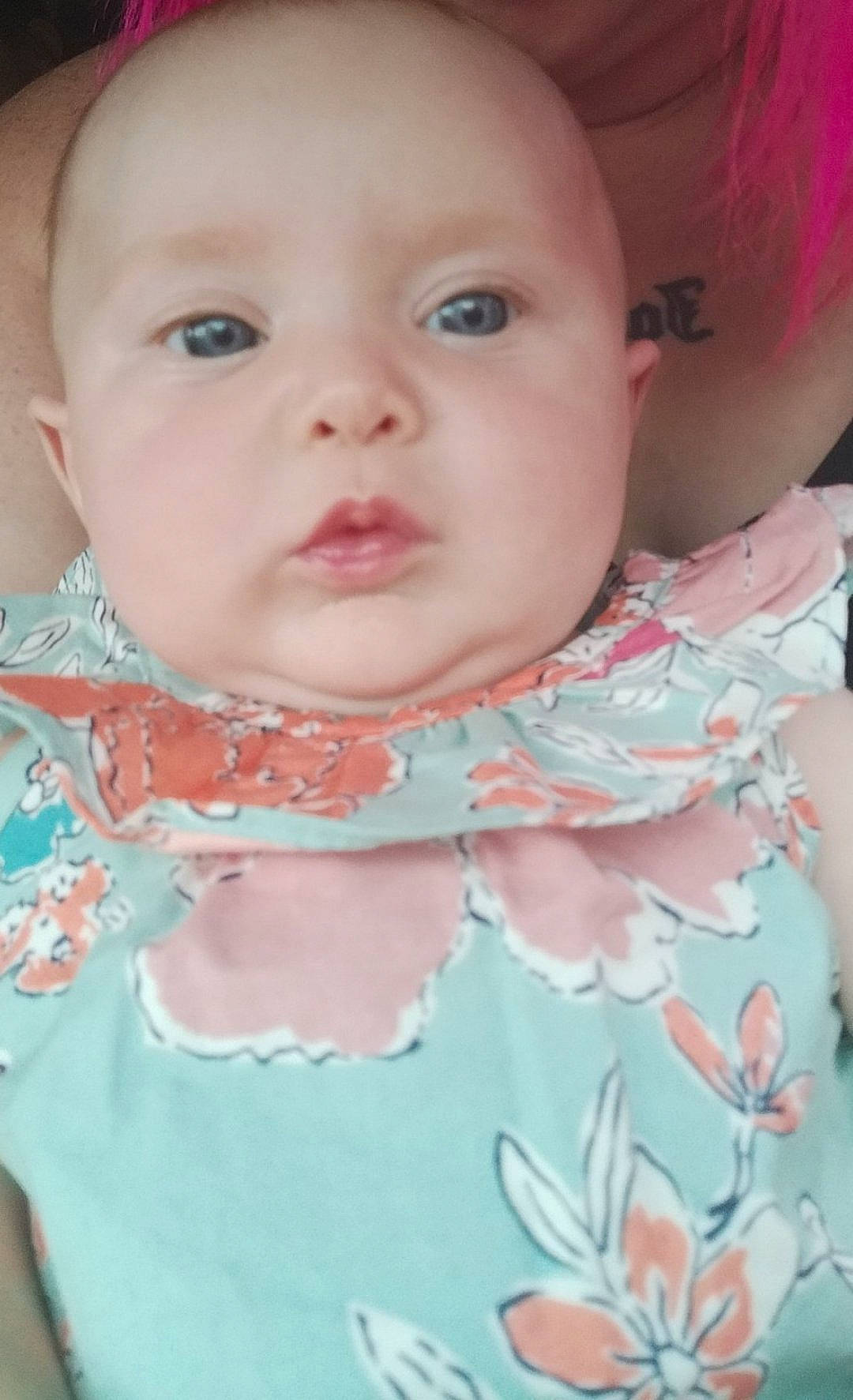 Brooklyn is registered to the contest to win money with this photo: baby, baby_toddler_clothing, cheek, chin, collar, dress, eyebrow, eyelash, human_body, iris, lip, mouth, neck, nose, organ, person, pink, skin, sleeve, textile