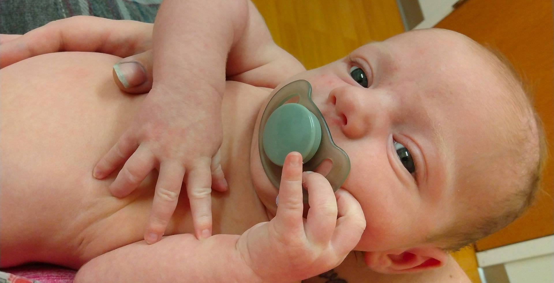 Noah joined the competition — help win amazing prizes! baby, baby_grabbing_for_something, baby_products, baby_toddler_clothing, cheek, child, drinkware, ear, eyelash, finger, gesture, hand, happy, mouth, nail, neck, nose, person, skin, thumb