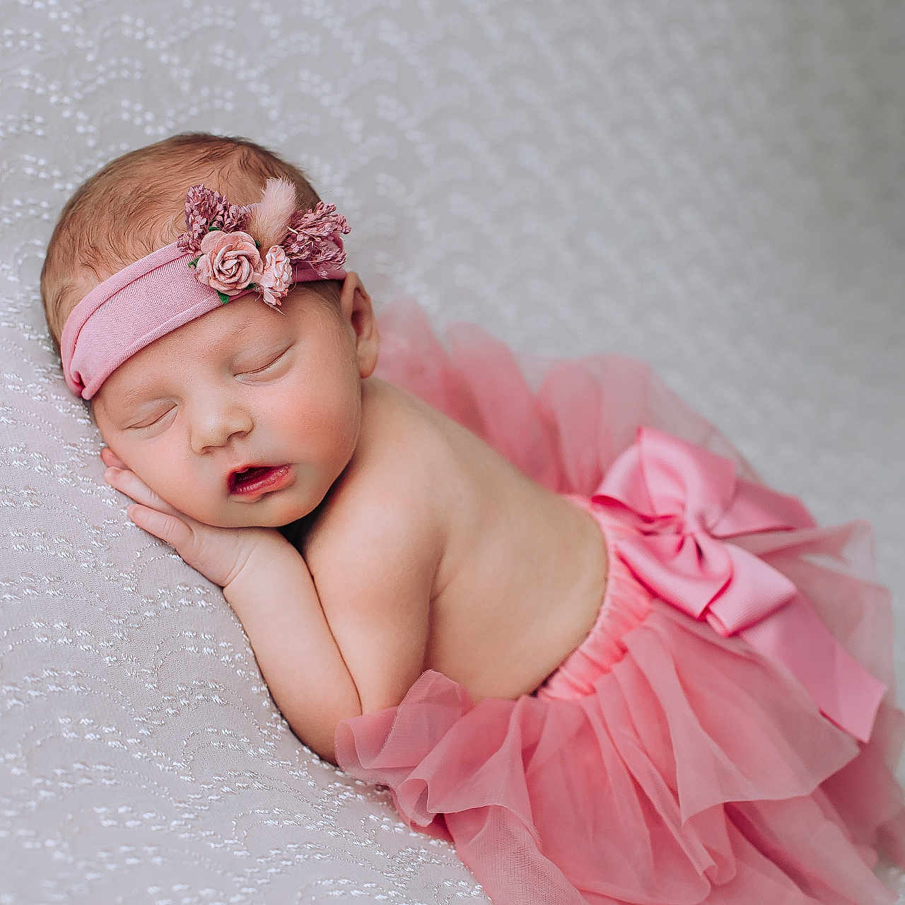 Leighton is registered to the contest to win money with this photo: adorable, baby, blanket, child, cute, delicate, flower, headband, infant, newborn, peaceful, pink, portrait, resting, skin, sleep, sleeping, small, soft, tutu