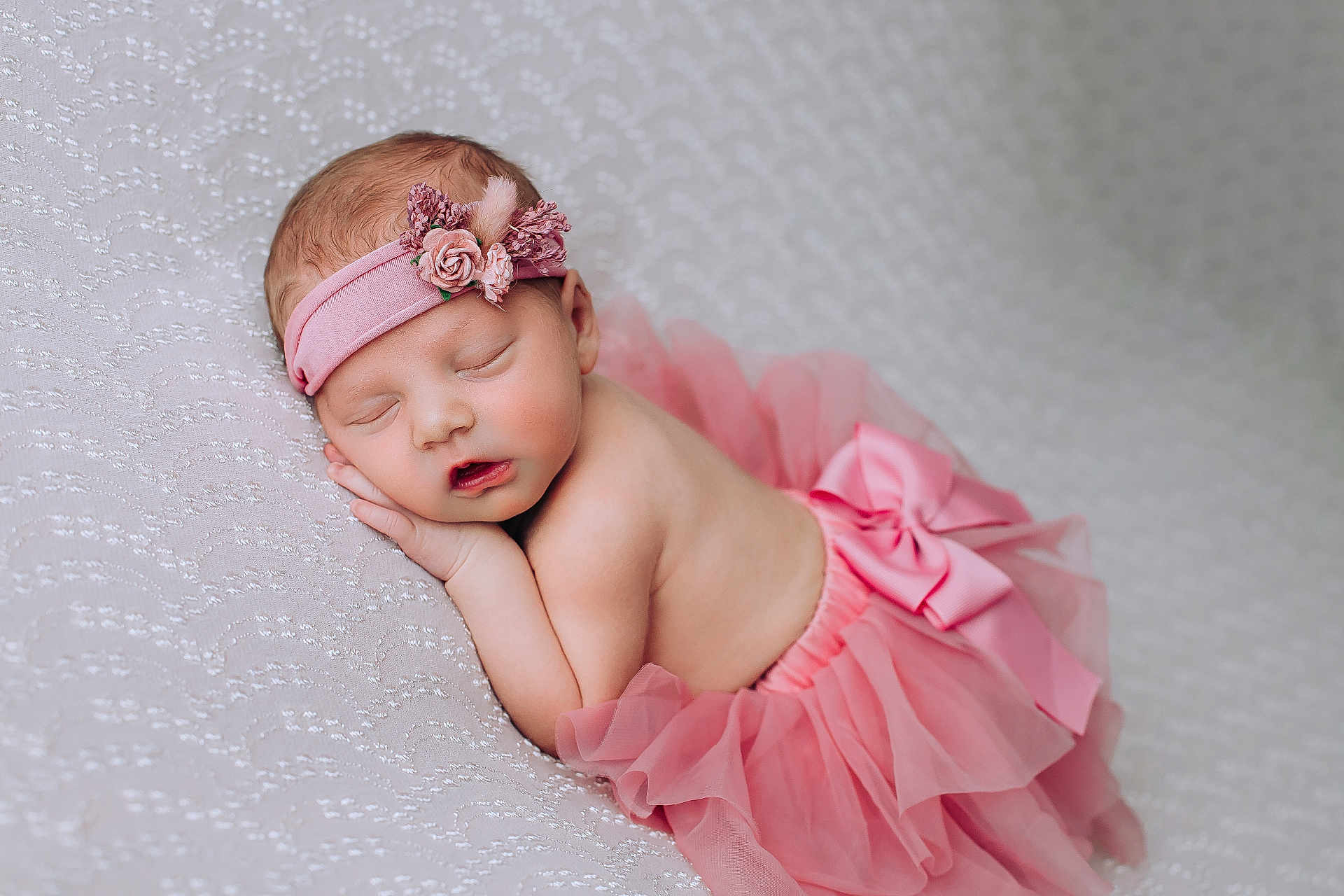 Leighton is registered to the contest to win money with this photo: baby, newborn, sleeping, pink, tutu, headband, flower, infant, cute, soft, portrait, child, peaceful, resting, blanket, adorable, small, delicate, skin, sleep