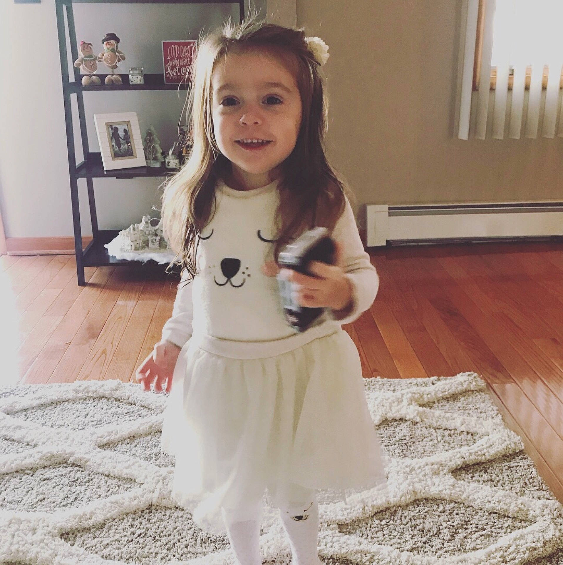 Sophia is registered to the contest to win money with this photo: child, costume, flooring, girl, hair_accessory, long_hair, neck, outerwear, pattern, person, product, shoulder, skin, sleeve, textile, toddler, trunk