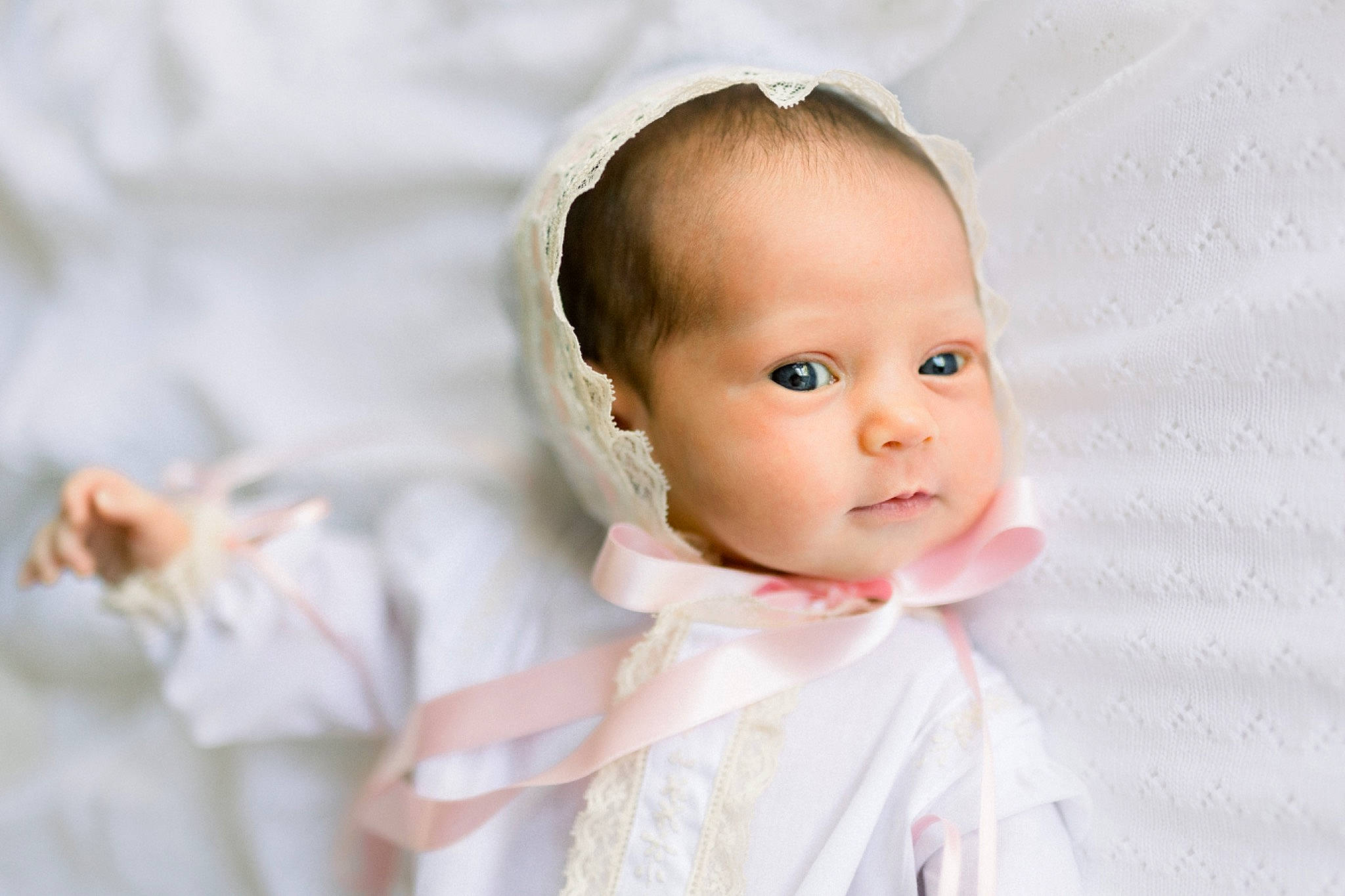 Mary Alice is registered to the contest to win money with this photo: baby, baby_toddler_clothing, cheek, child, dress, eyelash, fashion_accessory, flash_photography, gesture, hair_accessory, happy, headpiece, iris, linens, lip, outerwear, peach, person, skin, sleeve
