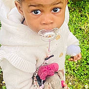 Voguene participe au concours pour gagner de l'argent avec cette photo : toddler, child, outdoor, grass, flowers, stuffed_toy, bunny, white_sweater, leggings, sneakers, pacifier, cute, young_child, nature, small_flowers, holding, looking_up, hair_tied, playful, innocent