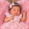 baby, newborn, sleeping, portrait, pink, dress, floral, headband, bow, blanket, furry, cozy, indoors, close_up, face, infant, fashion, peaceful, photography, soft_lighting