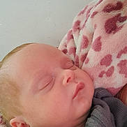 Malakai-Mackenzie joined the competition — help win amazing prizes! baby, sleeping, blanket, pink, white, face, infant, cozy, soft, closeup, peaceful, child, newborn, portrait, skin, head, ear, clothing, rest, comfort