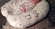 Jojo joined the competition — help win amazing prizes! newborn, baby, infant, sleeping, face, portrait, onesie, pink, monkey, nursing_pillow, blanket, bed, bedroom, pillows, cozy, indoors, textile, resting, peaceful, photograph